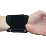 Black adjustable wrist support for padel and tennis players